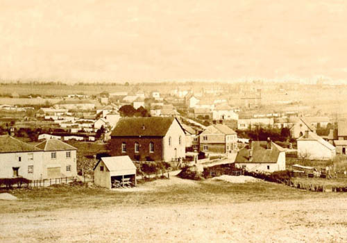 An image for Winterslow Parish Council website showing a vintage village photograph