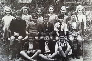 An image for Winterslow Parish Council website showing a vintage village photograph of schoolchildren