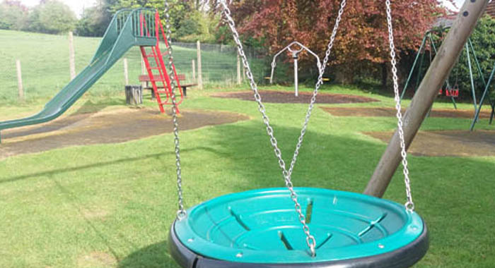 An image for Winterslow Parish Council website showing a childs swing